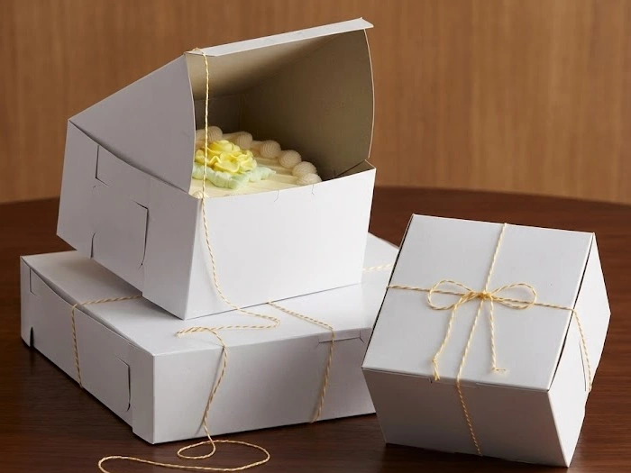 ایده بسته بندی کیک خانگی برای فروش با جعبه مقوایی محکم مخصوص کیک‌های چندنفره