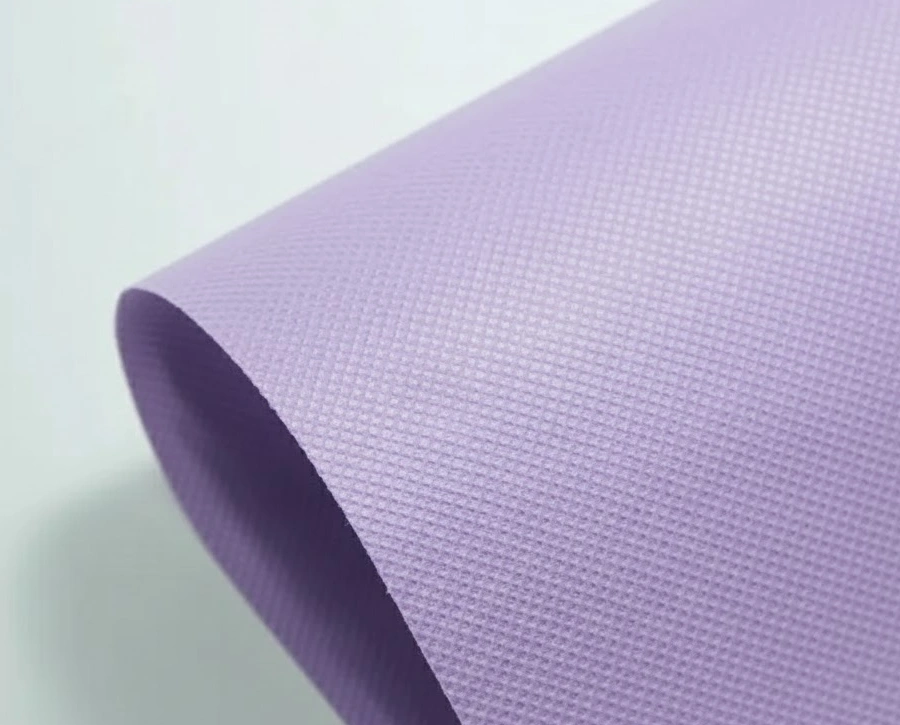 نمایی نزدیک از پارچه اسپان باند گرماژ 60